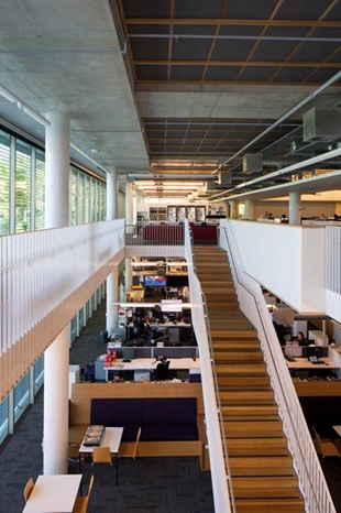 Light penetrates the floors through floor-to-ceiling glazing.